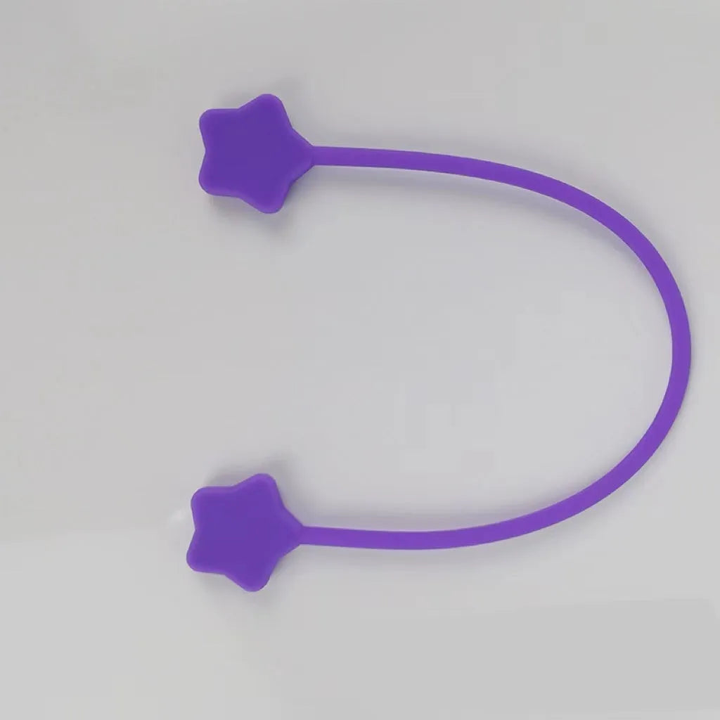 Silicone wire winder with magnet for organising cables in assorted colours on a white background.