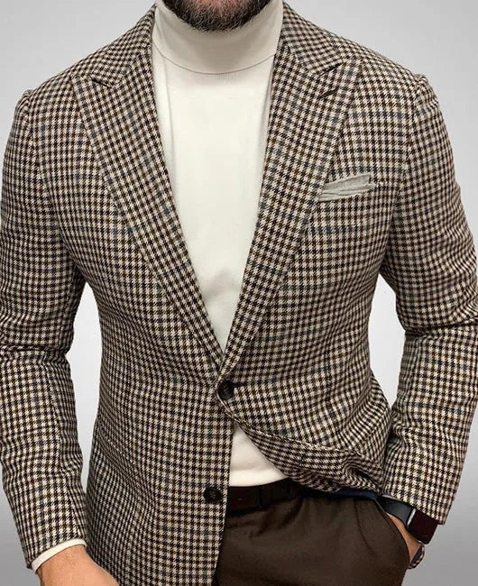 Men's black slim fit suit jacket with two buttons and large top-stitch pockets.