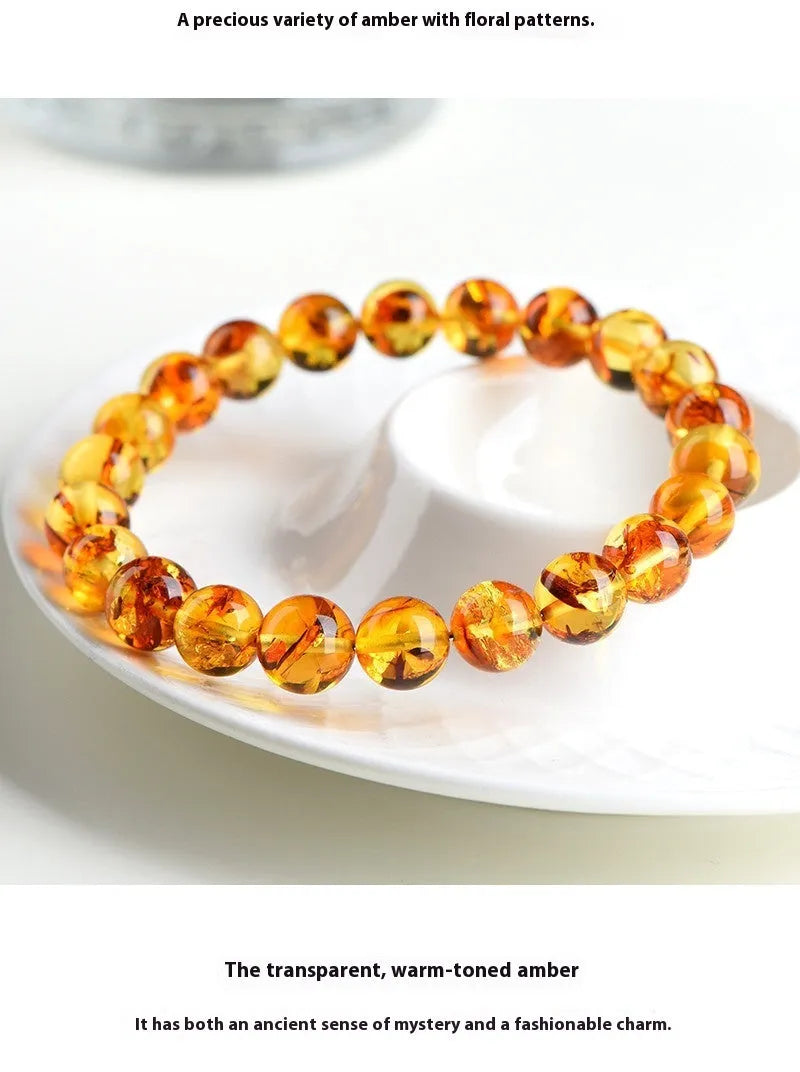 Natural yellow piebald amber geometric bracelet with polished beads