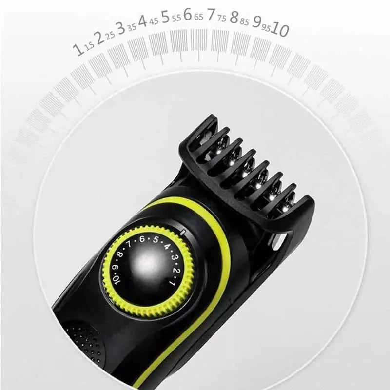 Black KM-696 rechargeable electric hair clipper set with stainless steel blade and cleaning brush.