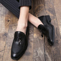 Men's black slip on shoes with pointed toe and tassel decoration for business style