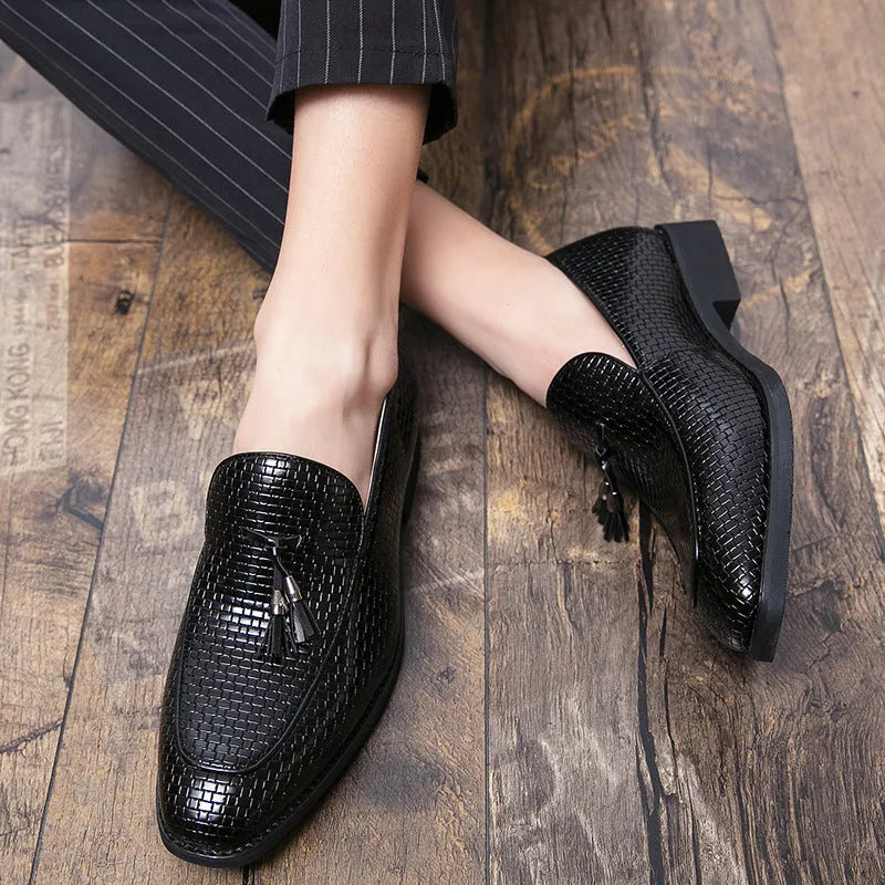 Men's black slip on shoes with pointed toe and tassel decoration for business style