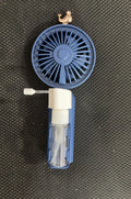 USB-powered personal handheld fan in apricot colour with plastic nozzle