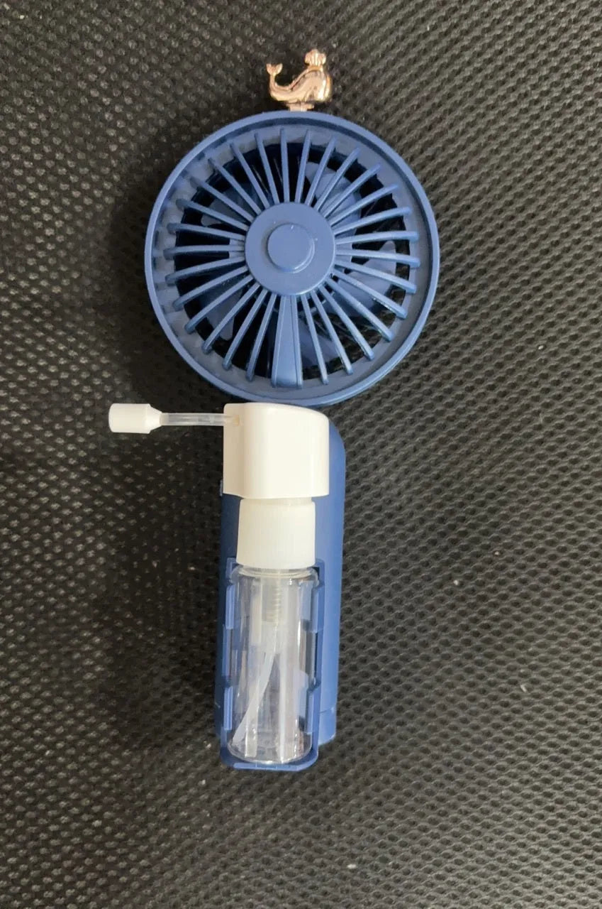 USB-powered personal handheld fan in apricot colour with plastic nozzle