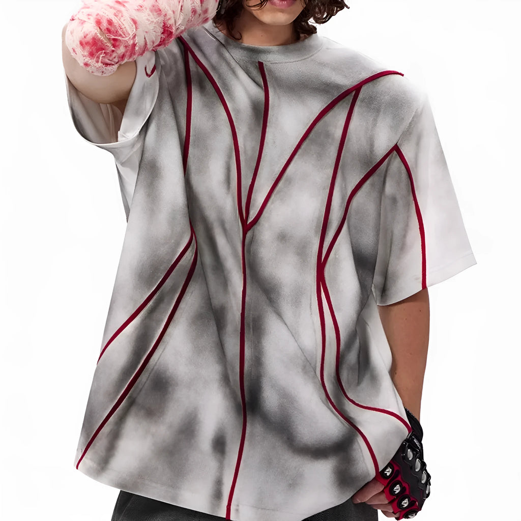 Women's padded shoulder short sleeve T-shirt with textured line patchwork design on front.