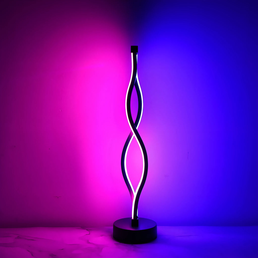 Black aluminium desk lamp with touch dimming controls showing three colour temperature settings