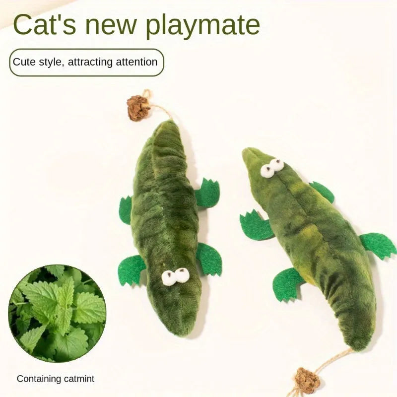Green plush alligator-shaped cat toy with plant-based catnip and peppermint scent