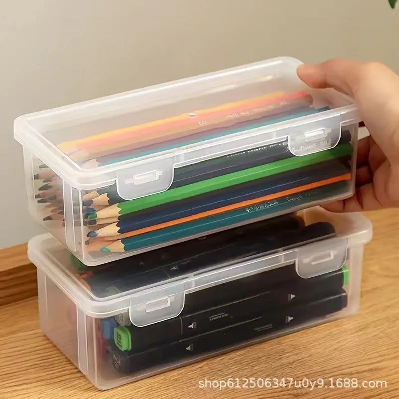 Clear transparent large pencil storage box filled with colouring pencils and crayons