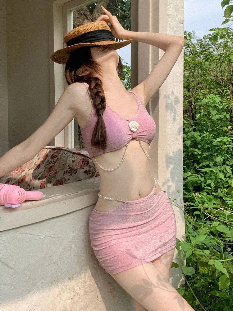 Women's black or pink three-piece bikini swimsuit with polyester fabric for swimming and hot springs