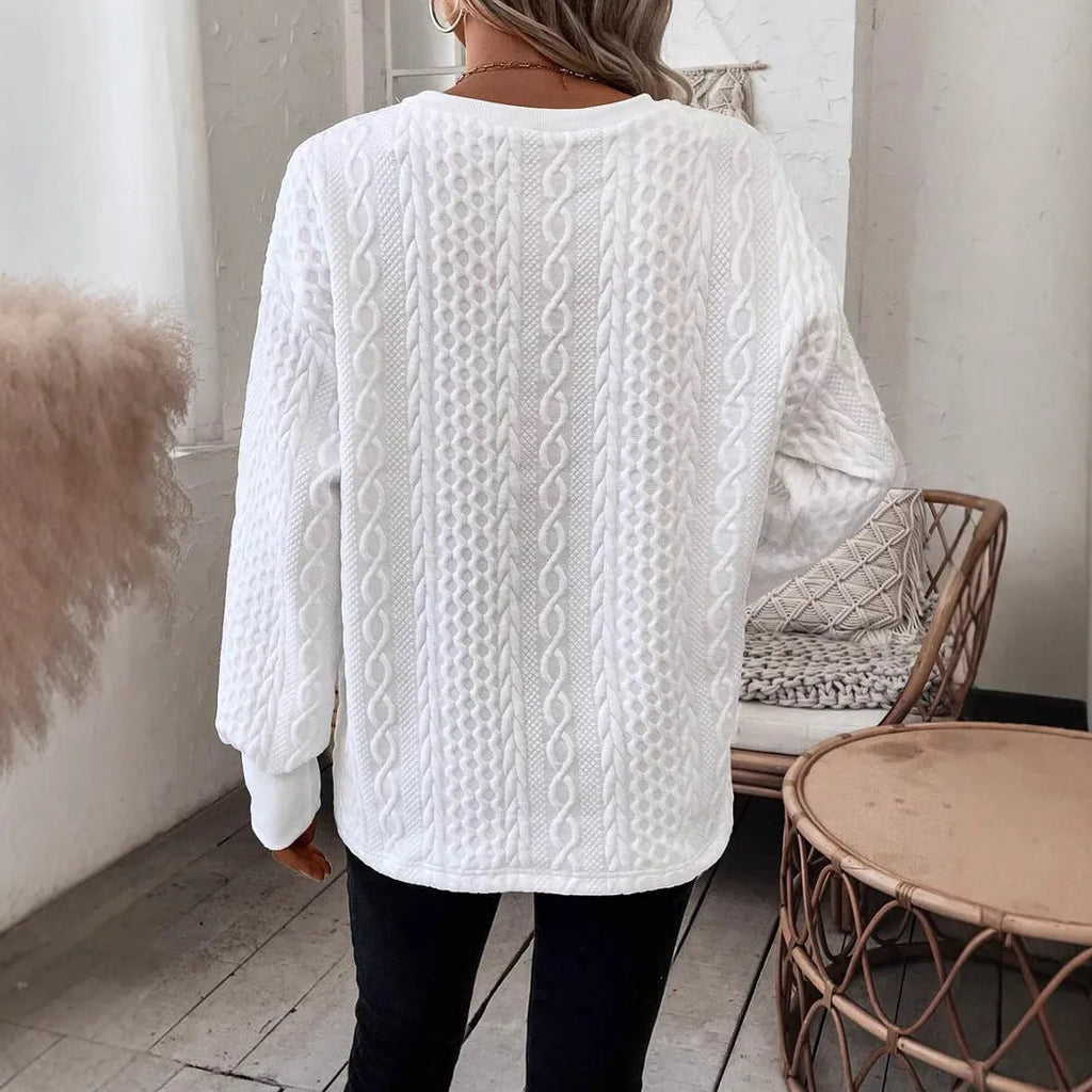 Milky white loose fit men's long sleeve T-shirt with a raised 3D pattern, casual style.