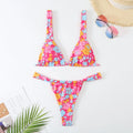 Women's floral printed polyester bikini swimsuit in blue, rose red, sky blue, and white colour options