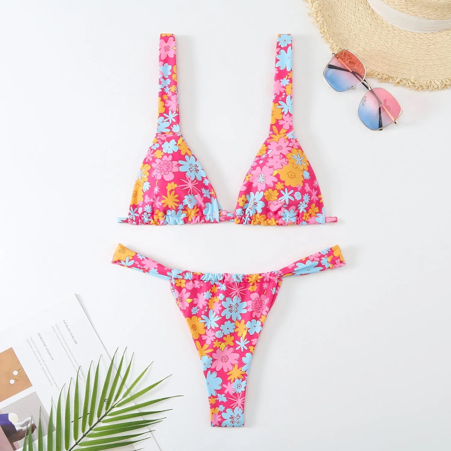 Women's floral printed polyester bikini swimsuit in blue, rose red, sky blue, and white colour options
