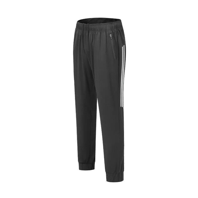 Men's black polyester running trousers with mid-waist design for exercise and sports activities