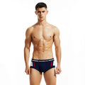 Men's red cotton low-waist boxer briefs on a plain background