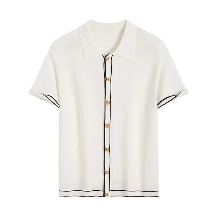 White short sleeve cardigan with contrasting colour lapels on a hanger.