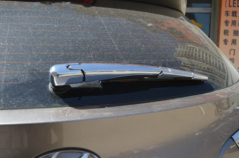 Four silver ABS plastic rear window wiper cover trims for Hyundai 2010 models.