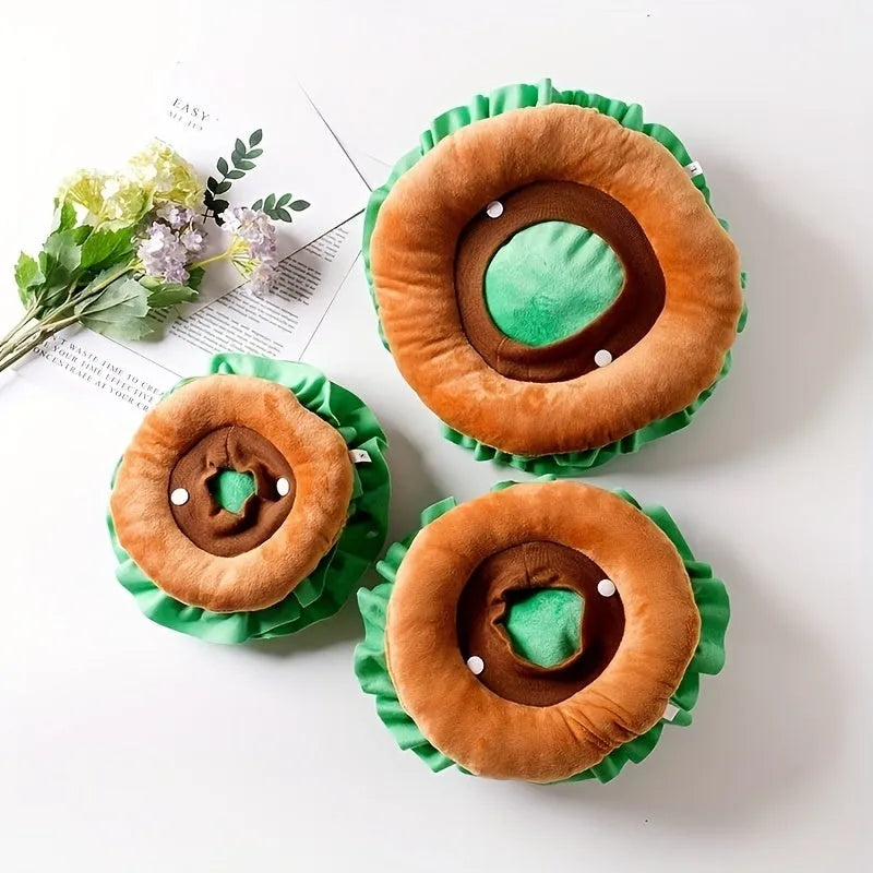 A soft plush burger-shaped headdress collar for a cat or small dog on a white background.