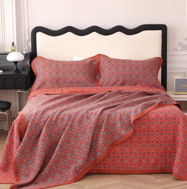 Cotton gauze bed blanket set with floral botanical pattern and two matching pillowcases