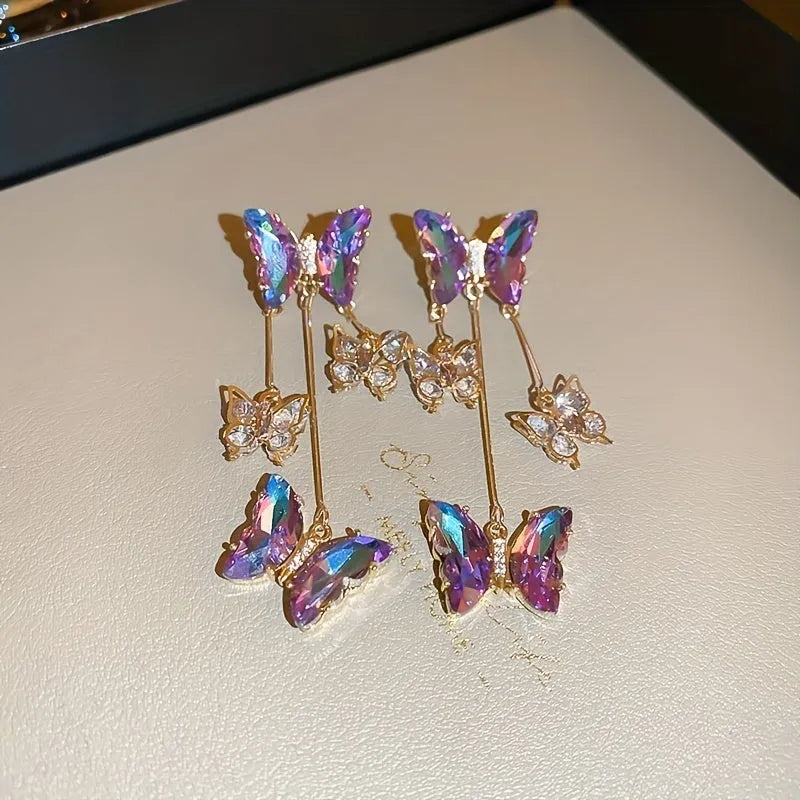 Silver needle blue purple butterfly tassel earrings with crystal flowers for women.