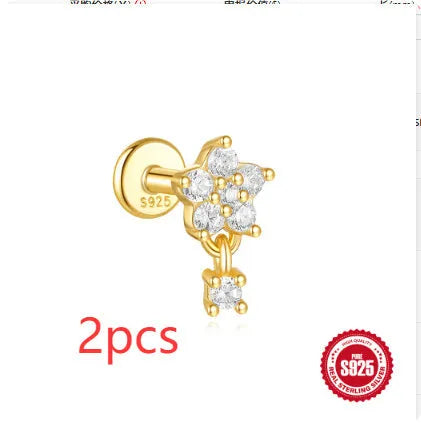S925 sterling silver geometric star earrings with embedded moon and diamond detail in a gold colour.