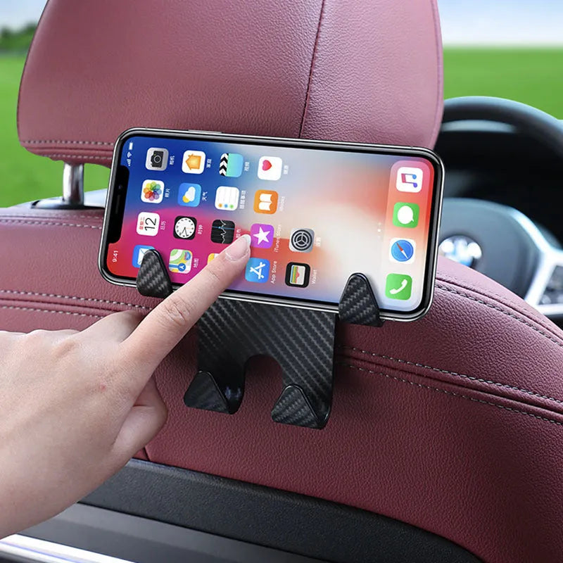 Black carbon fibre style car hook with integrated phone bracket measuring 11.5 by 8.1 by 4.7 centimetres