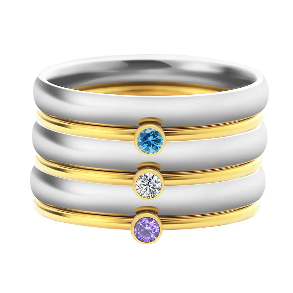 Titanium steel engraved ring with December birthstone and gold-plated steel lettering on geometric band