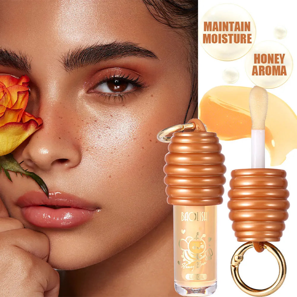 Honey lip gloss in portable keychain pannier bag packaging for on-the-go moisturising