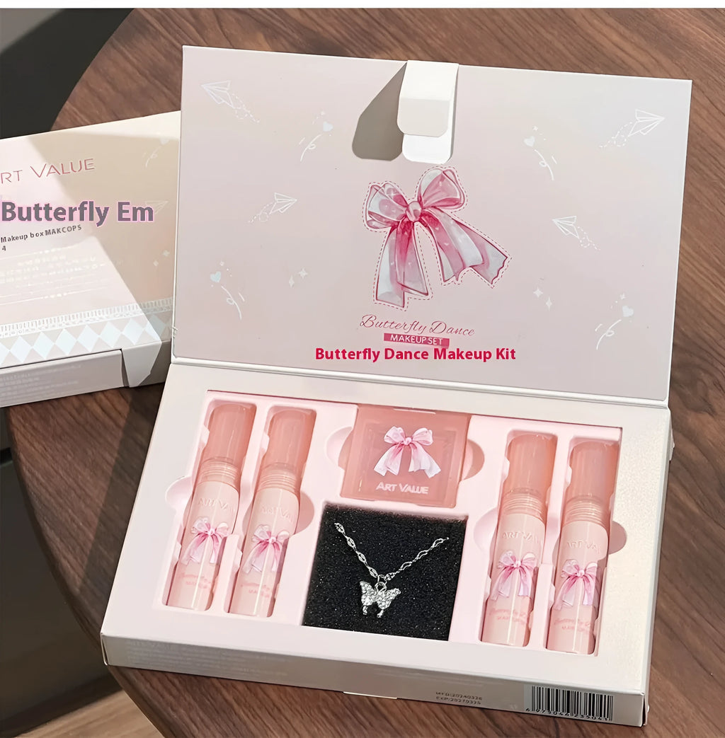 Butterfly Box makeup collection showing pink lip muds, powder blusher and matching necklace