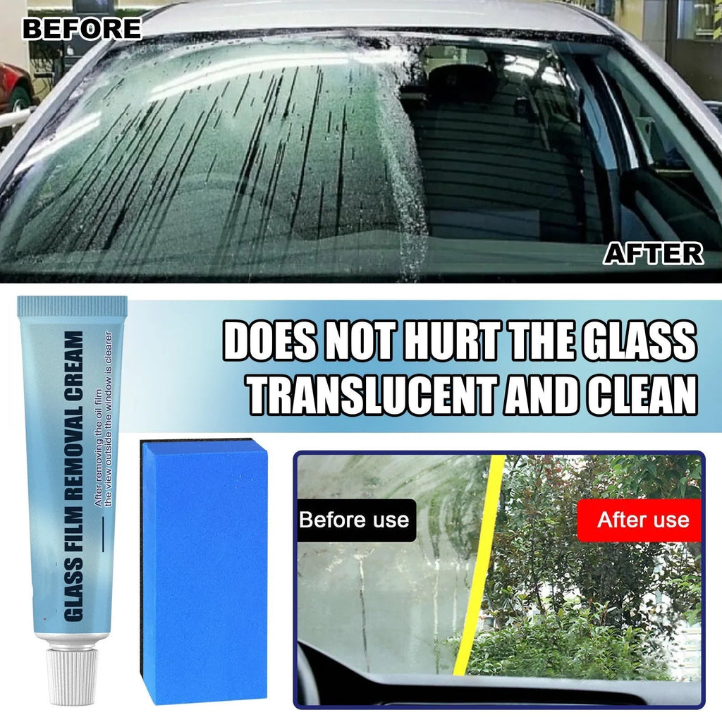 Blue car glass oil film remover tube and soft sponge brush on a car windscreen.