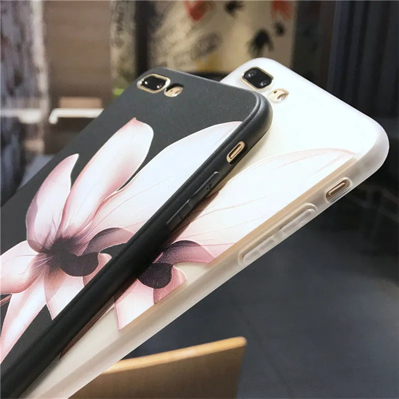 Embossed single flower design on black TPU iPhone case showing back cover protection