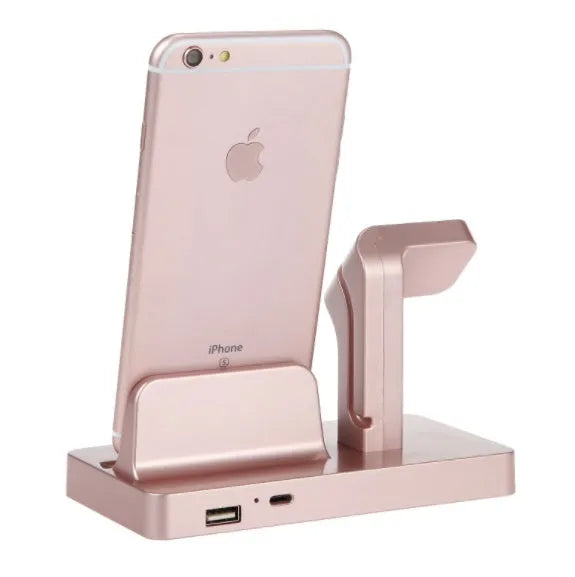 White charging dock station holding iPhone and Apple Watch for simultaneous desktop charging