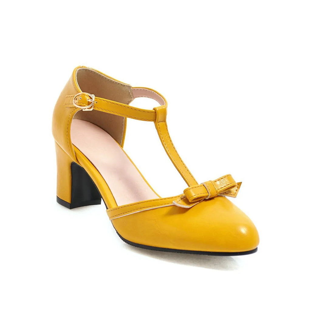 Women's apricot colour sandals with bow tie detail, chunky 6.5cm block heel, and adjustable buckle strap