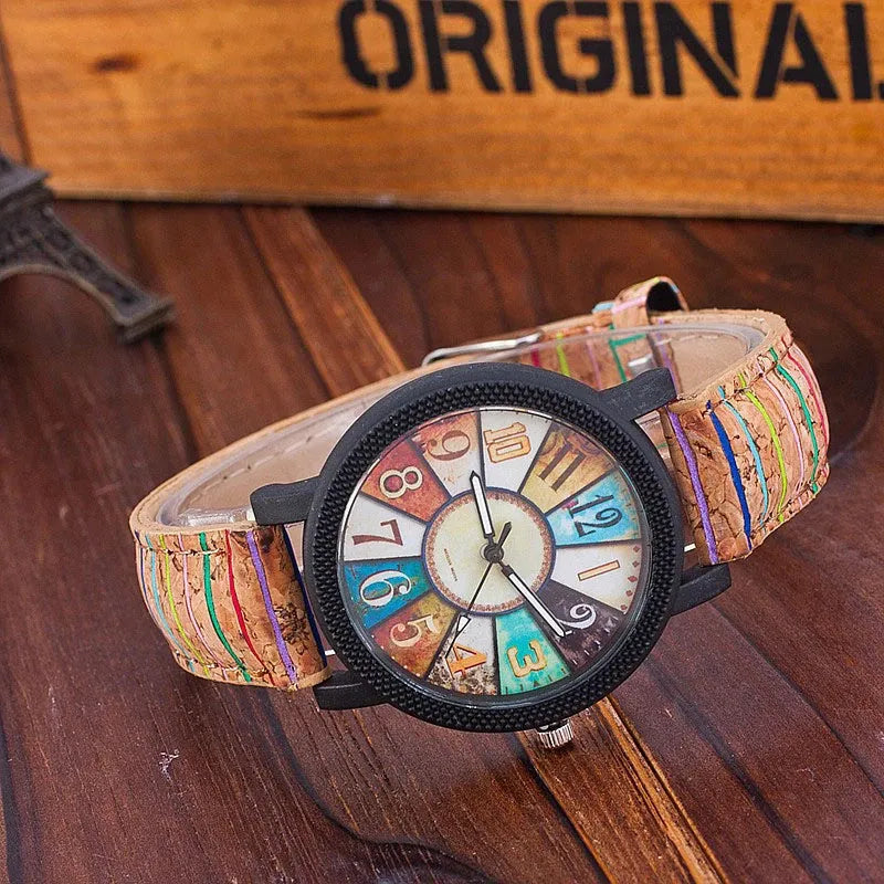 Women's vintage style quartz watch with brown leather strap and 37mm round silver dial