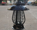 Black solar mosquito lamp with solar panel for outdoor garden insect control