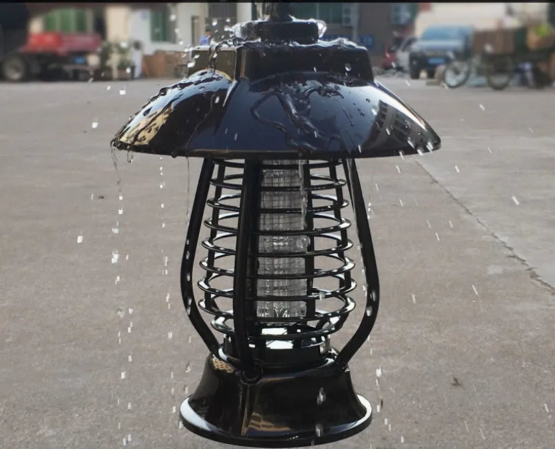 Black solar mosquito lamp with solar panel for outdoor garden insect control