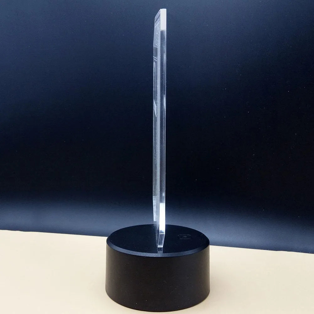 3D acrylic LED desk lamp with remote control showing colour change illumination
