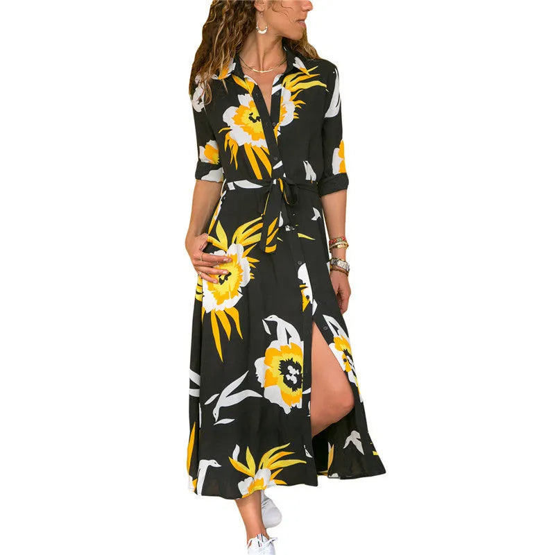 V-neck chiffon dress with high waist and printed pattern, shown in black colour.