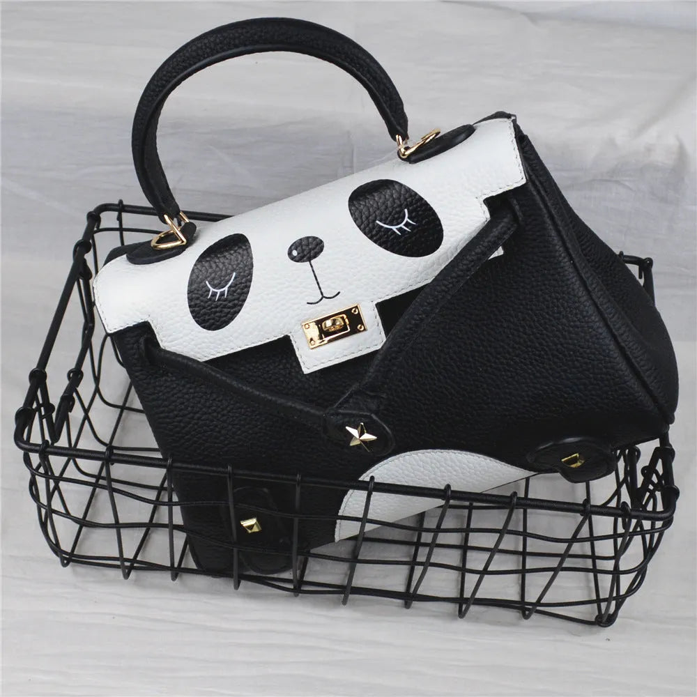Ladies panda handbag in cow leather with animal print pattern available in two sizes