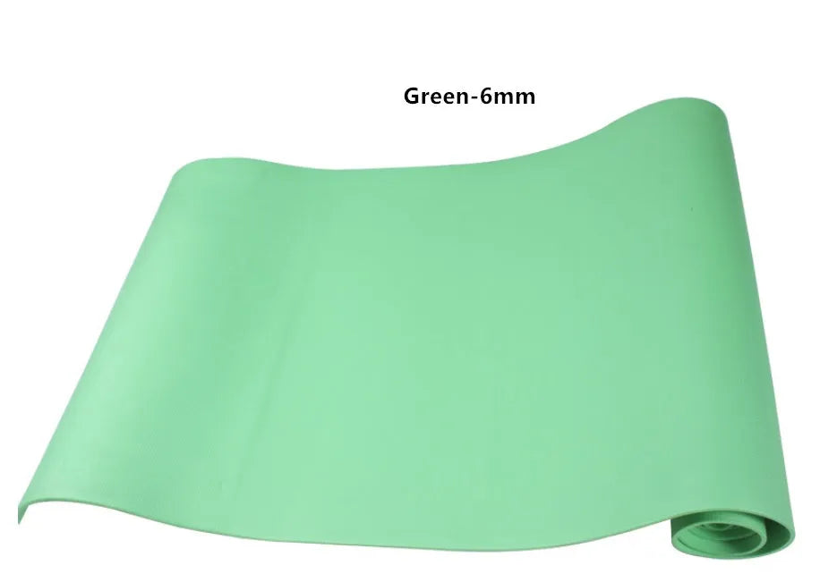 Red EVA yoga mat with textured anti-skid surface, shown rolled and unrolled.