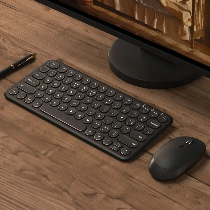 White ultra-thin wireless keyboard and mouse set with USB receiver and keyboard film on desk