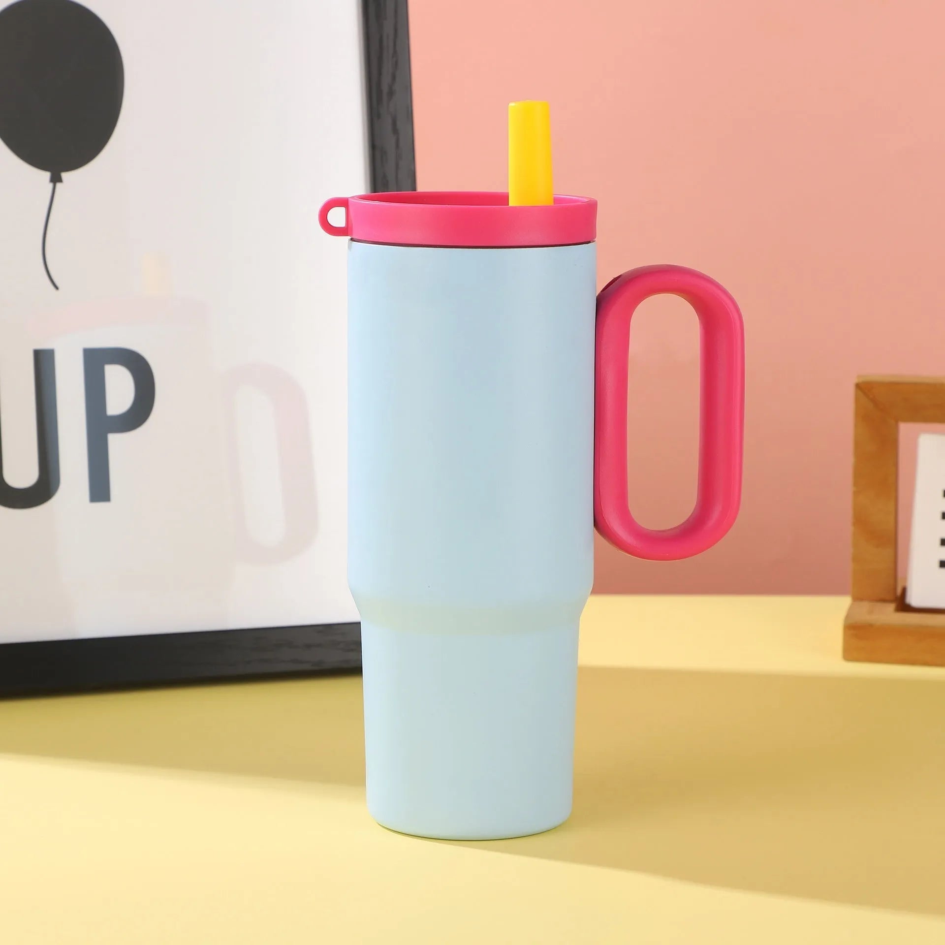 Large stainless steel insulated straw cup with handle in multiple colour options.