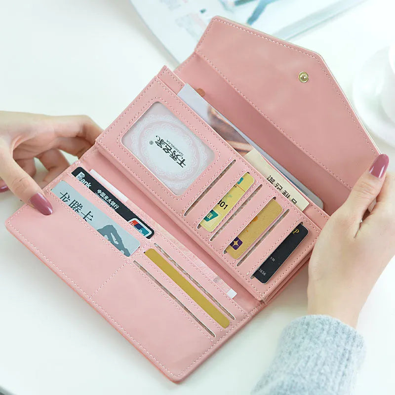Tri-fold student wallet with buckle closure in multiple colour options showing dimensions