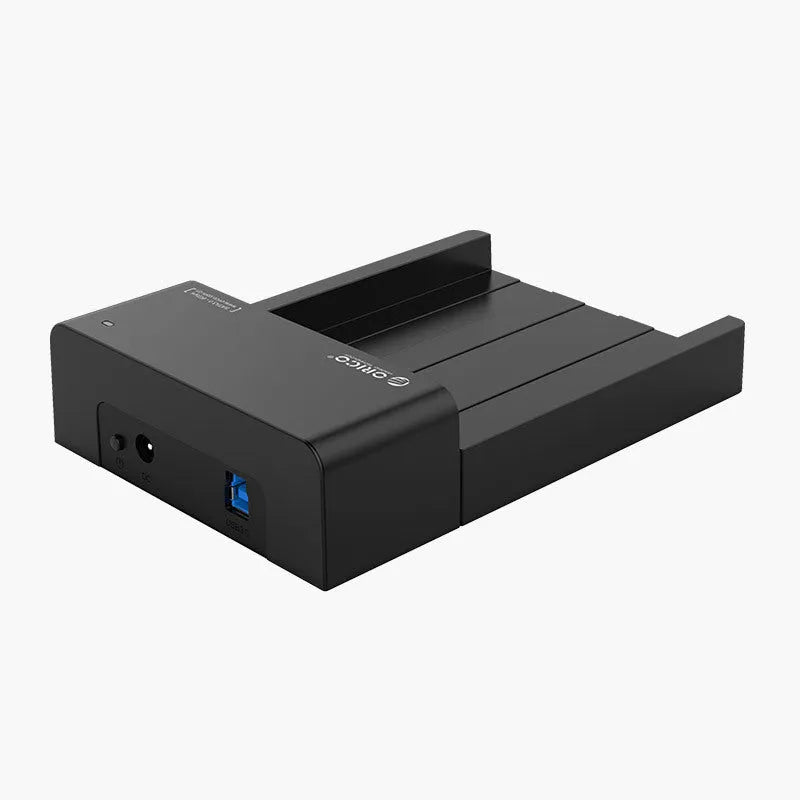 Black plastic hard disk box for 2.5-inch SATA drives with included data cable.