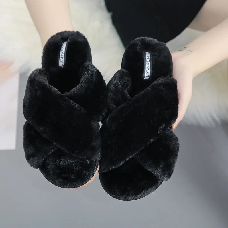 Cross strap open-toe fur slippers in multiple colours on a non-slip rubber sole.