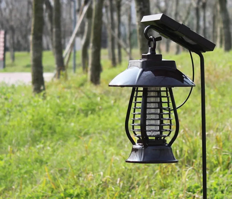 Black solar mosquito lamp with solar panel for outdoor garden insect control