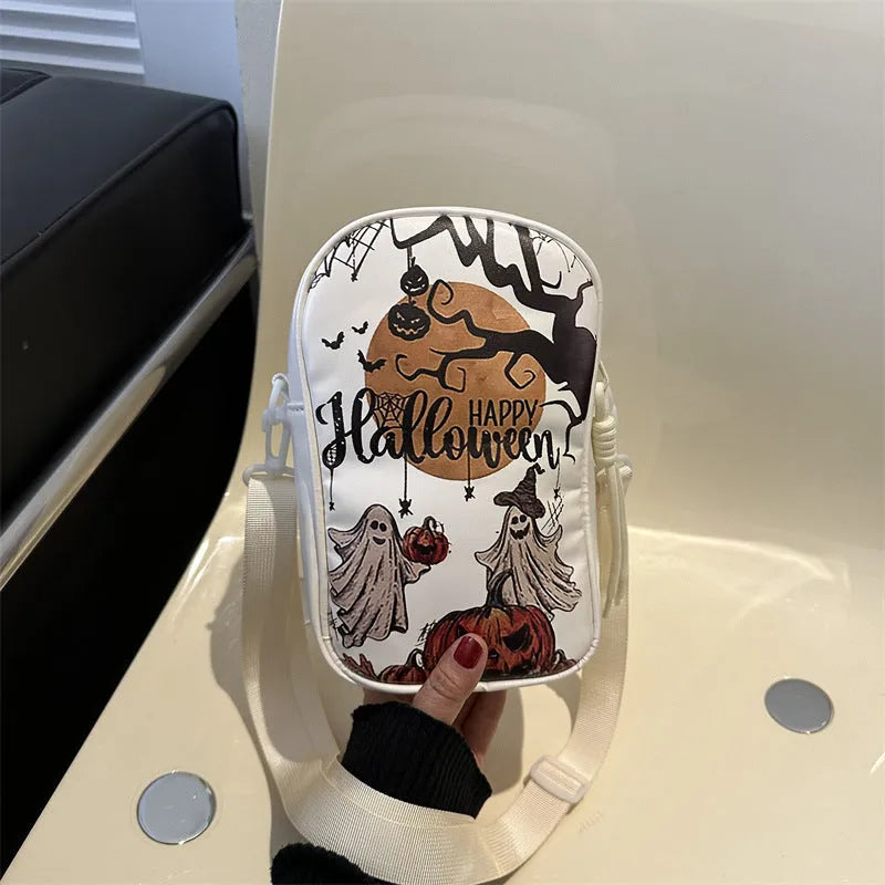 Halloween graffiti print crossbody bag showing pumpkin, ghost and bat designs in medium 14x23x9.5cm size