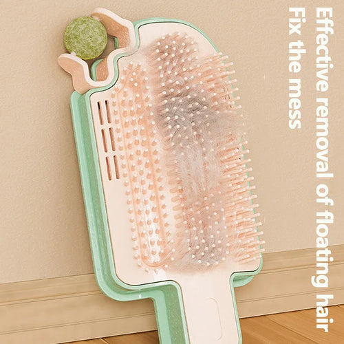Ice cream shaped cat rubbing toy with interchangeable heads including mint ball and feather attachments