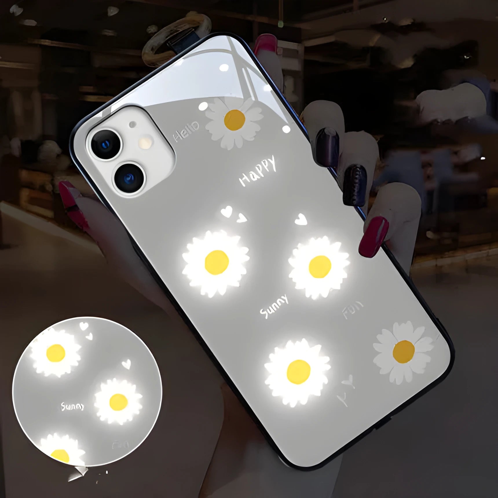 White luminous iPhone case with purple daisy design and voice-activated colour light on a table.