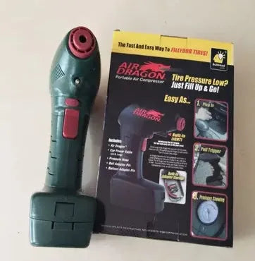 Portable 12V electric car air pump unit with power cable and tyre valve nozzle.