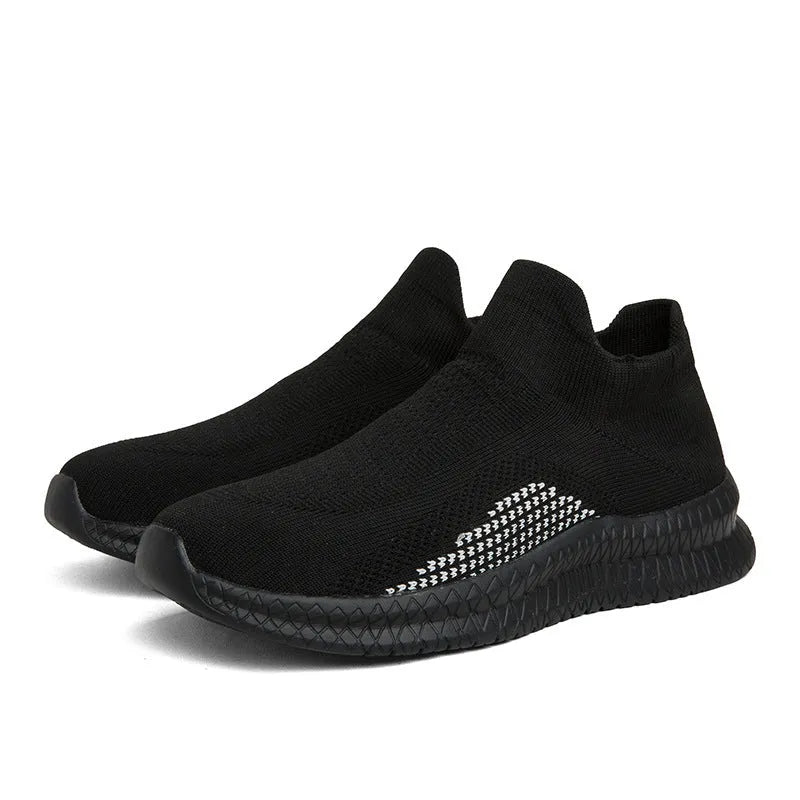 Men's solid colour casual sneakers with fabric upper and low-top design on a white background.